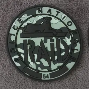 Ecusson RAID 54 - Camouflage